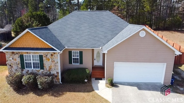 view of front of property with a garage