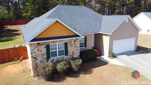 view of front of property featuring a garage