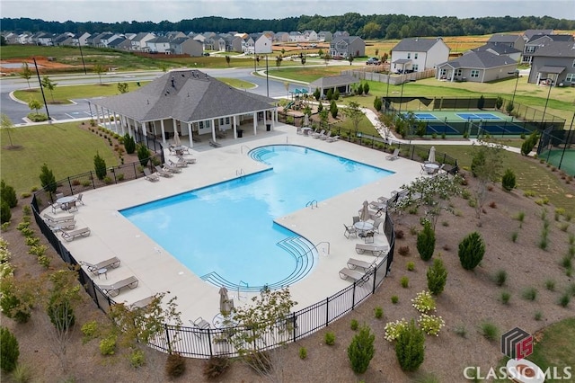 view of pool featuring a patio