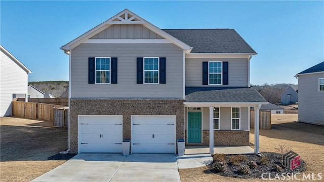 view of front of property with a garage