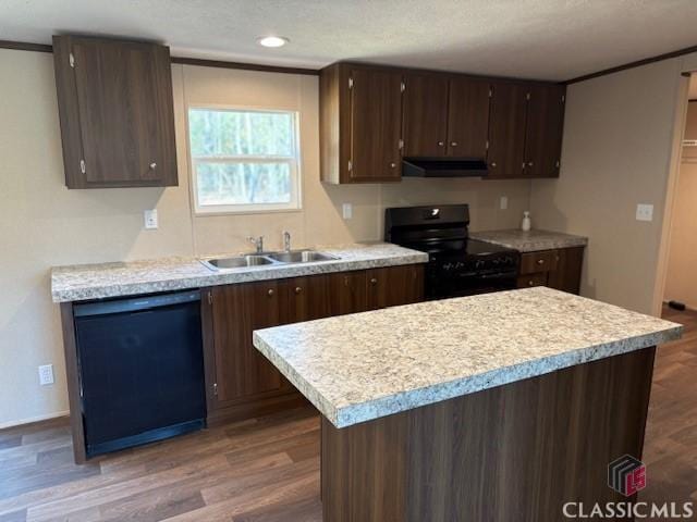 kitchen with dark hardwood / wood-style flooring, sink, dark brown cabinets, and black appliances