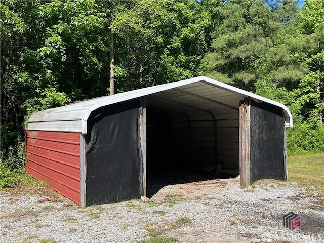 view of outdoor structure with a carport