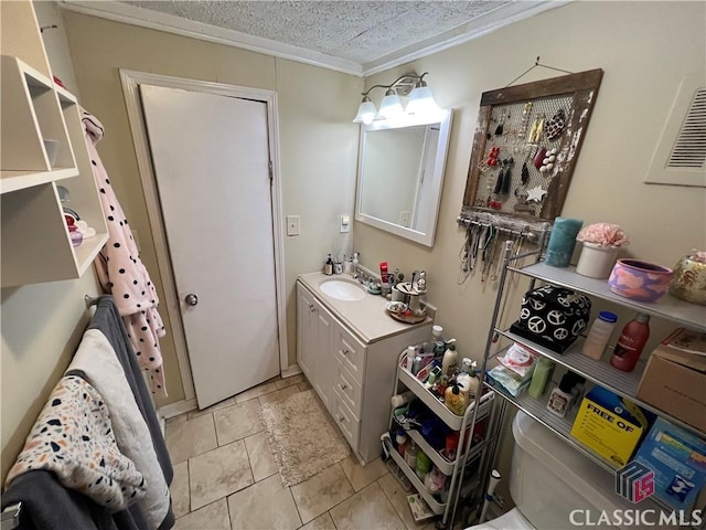 bathroom featuring vanity and a textured ceiling