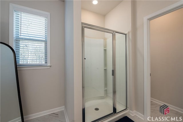 bathroom featuring walk in shower