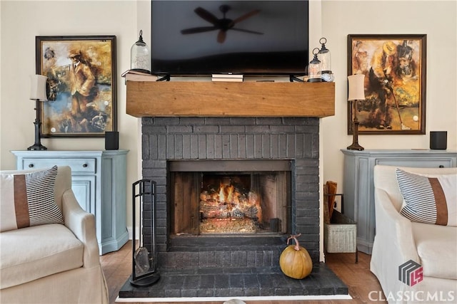 interior details with hardwood / wood-style flooring and a fireplace