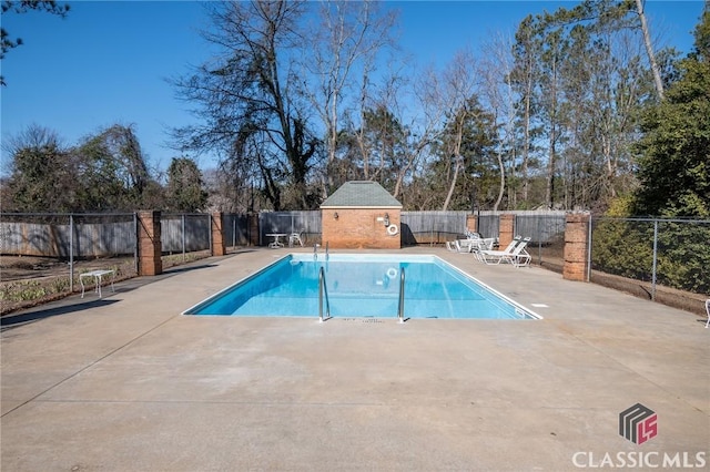 view of pool with a patio