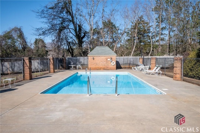 view of pool featuring a patio