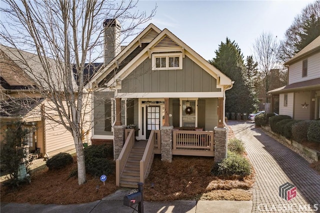 craftsman-style house with covered porch