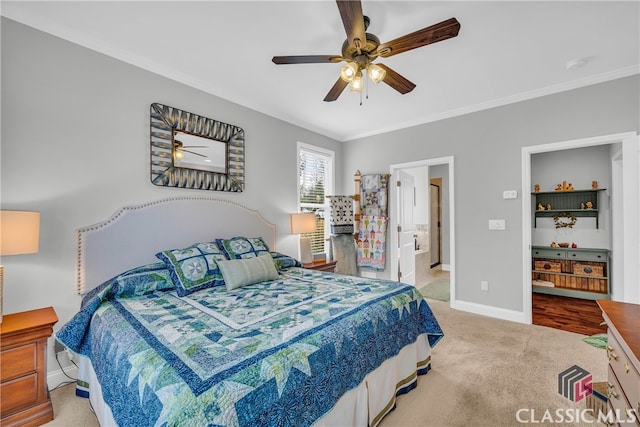 bedroom featuring crown molding, ceiling fan, and carpet