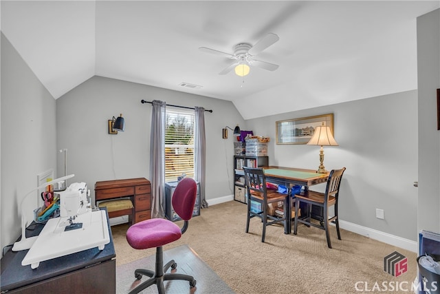 office space with light carpet, vaulted ceiling, and ceiling fan