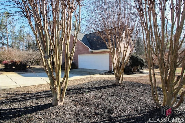 view of property exterior featuring a garage