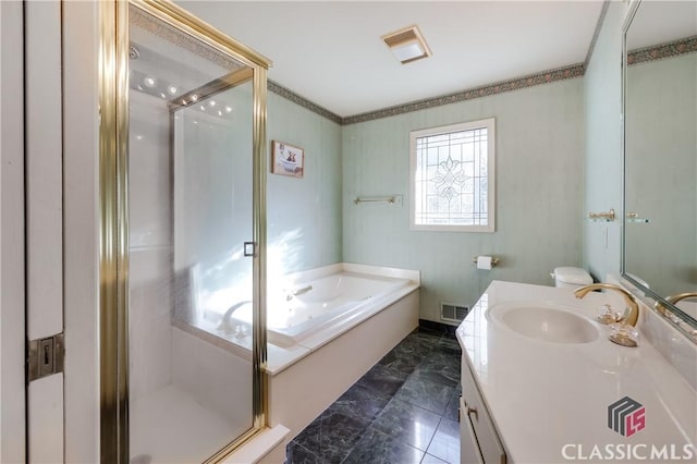 bathroom with vanity and separate shower and tub