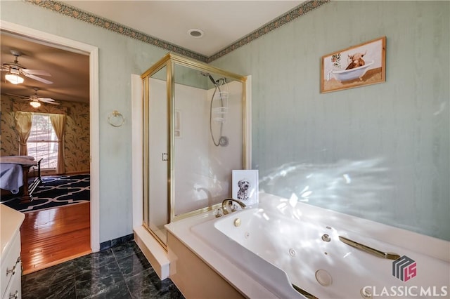 bathroom featuring separate shower and tub