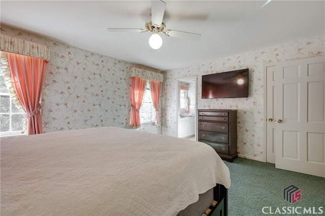 bedroom with ceiling fan and carpet flooring