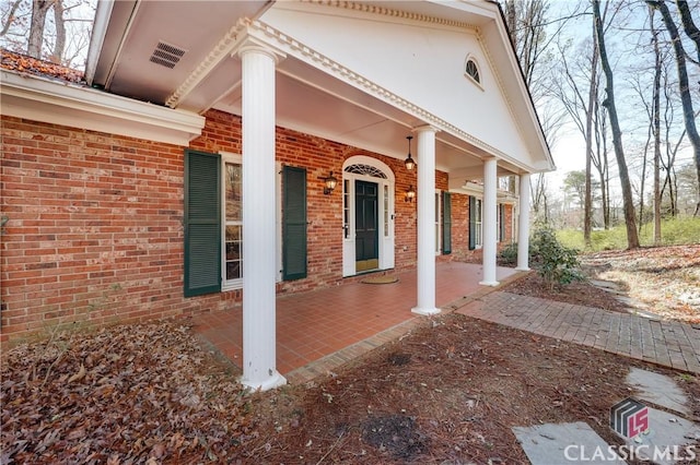 entrance to property with covered porch