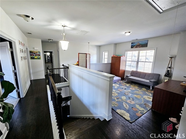 interior space with dark hardwood / wood-style floors