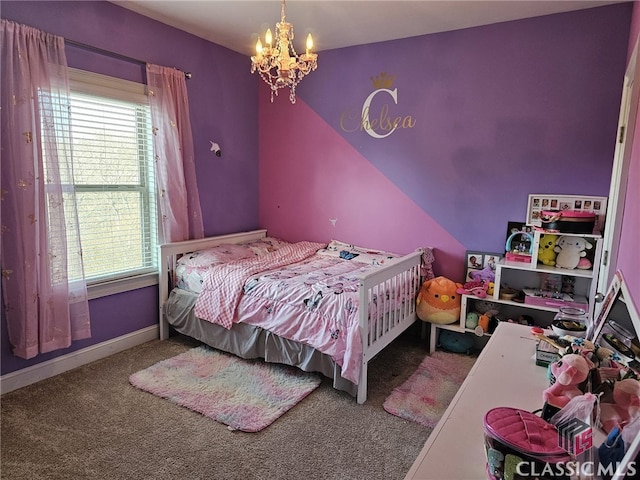 bedroom featuring carpet flooring, multiple windows, and an inviting chandelier