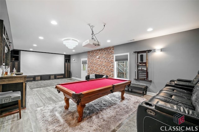 rec room featuring billiards and light hardwood / wood-style floors