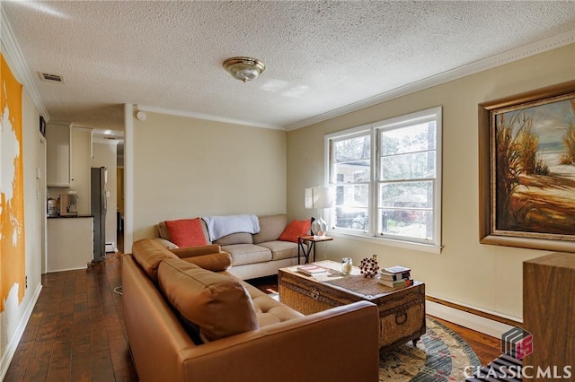 living room featuring dark wood-type flooring, crown molding, a textured ceiling, and a baseboard heating unit