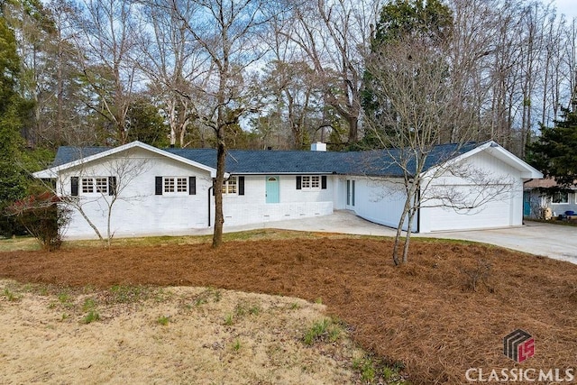 ranch-style house with a garage