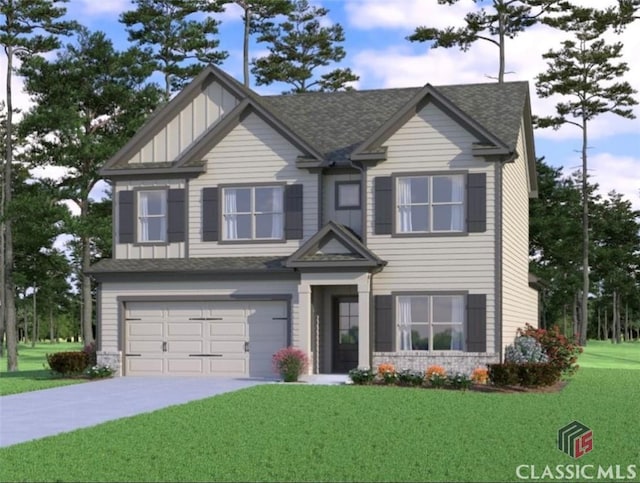 view of front of home featuring a garage and a front lawn