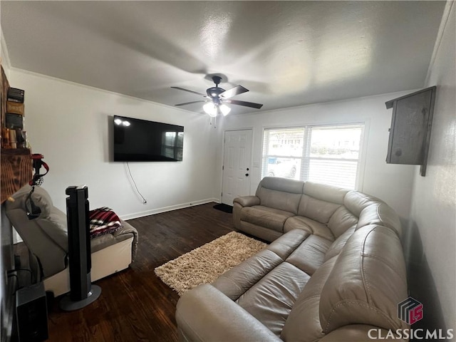 living room with dark wood-type flooring and ceiling fan