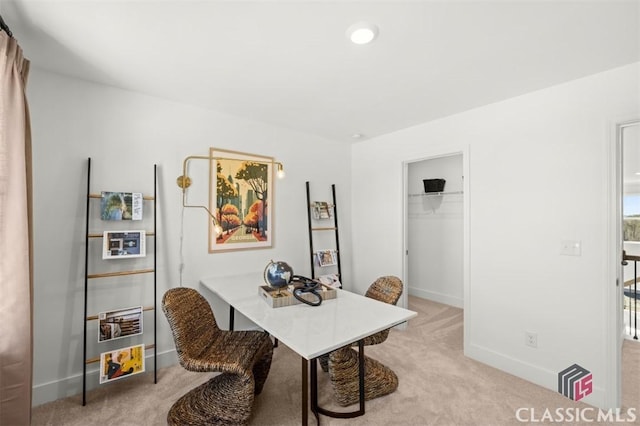 view of carpeted dining space