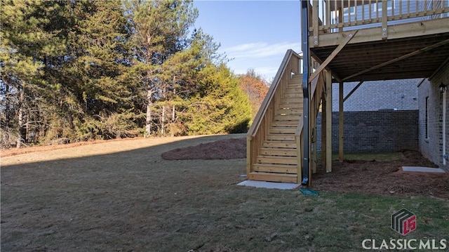 view of yard with a deck