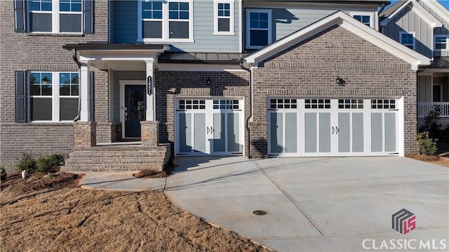 view of front of property with a garage