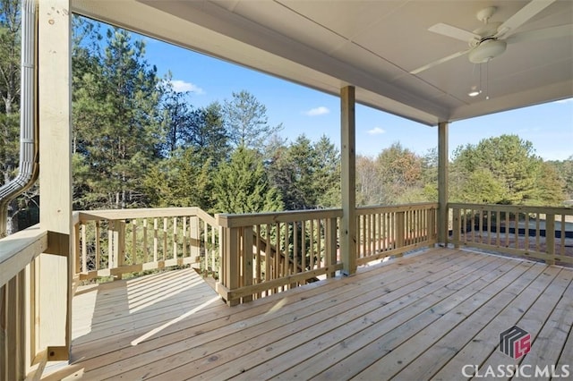 wooden deck with ceiling fan