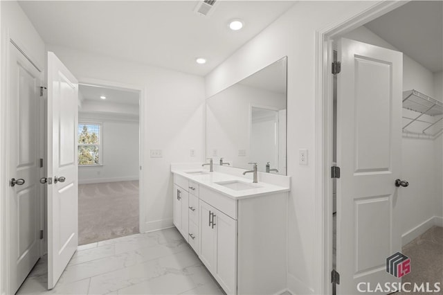 bathroom featuring vanity