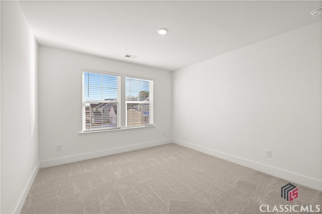 view of carpeted spare room