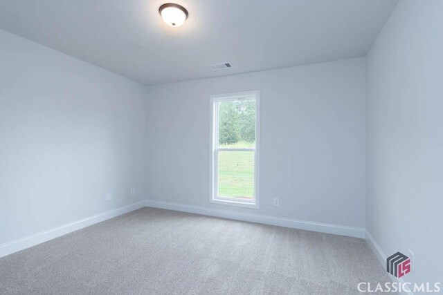 spare room with carpet flooring