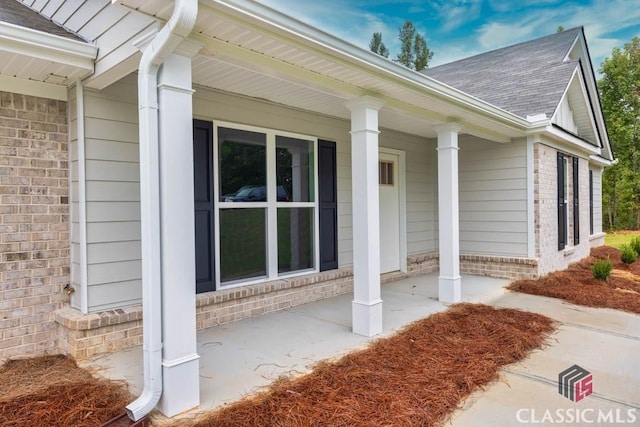 doorway to property with a porch