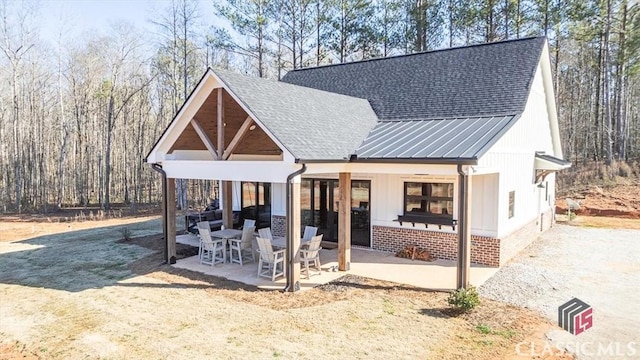 view of front of house with a patio