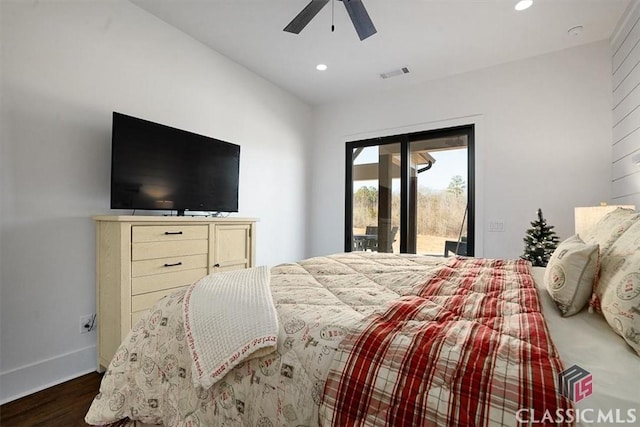 bedroom with dark hardwood / wood-style floors, access to outside, and ceiling fan