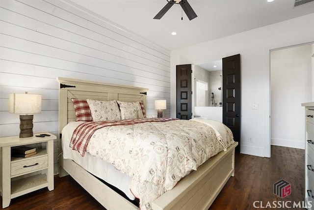 bedroom with ceiling fan and dark hardwood / wood-style flooring