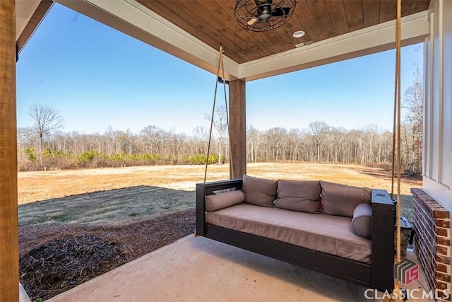 view of patio / terrace featuring ceiling fan