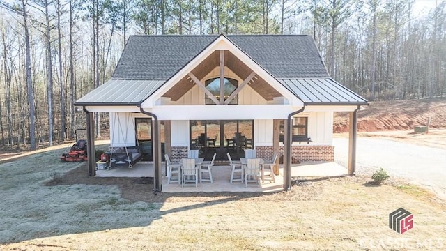 view of property's community with a patio