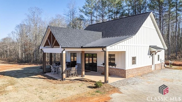 view of front of house featuring a patio