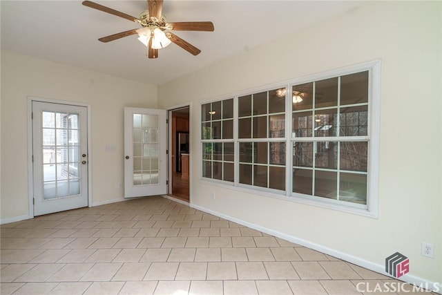 interior space featuring ceiling fan