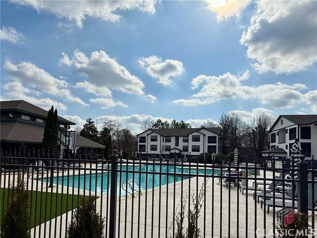 view of pool featuring a patio area