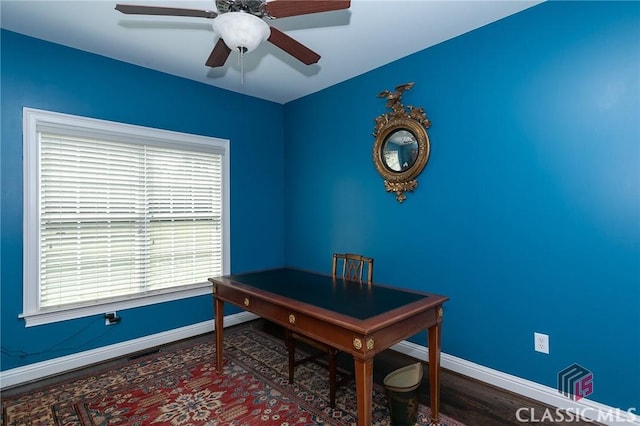 home office with ceiling fan and hardwood / wood-style floors