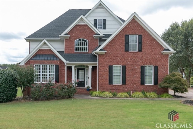 view of front of home featuring a front lawn