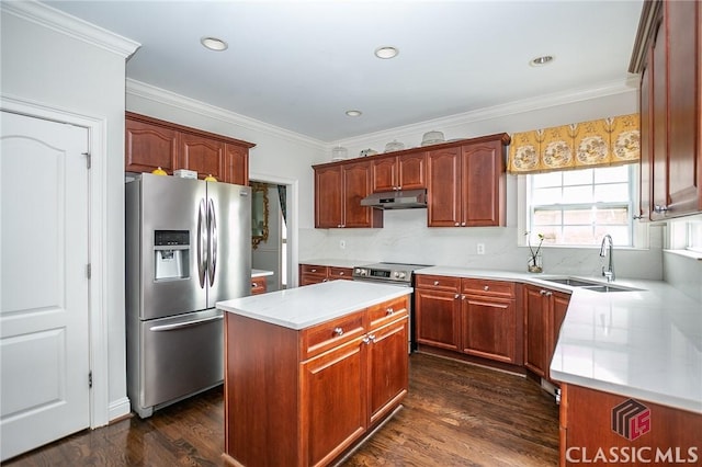 kitchen with stainless steel appliances, a center island, sink, and dark hardwood / wood-style floors