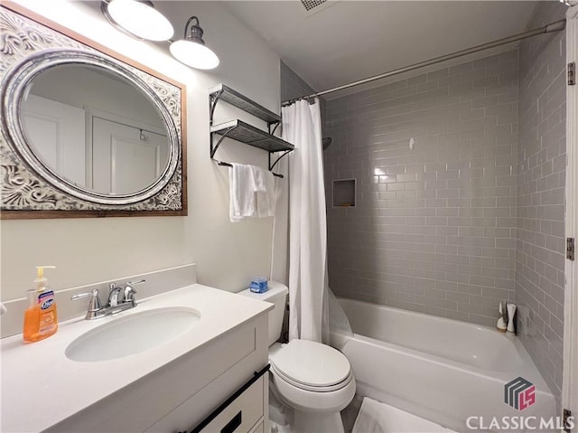 full bathroom with shower / bathtub combination with curtain, vanity, and toilet