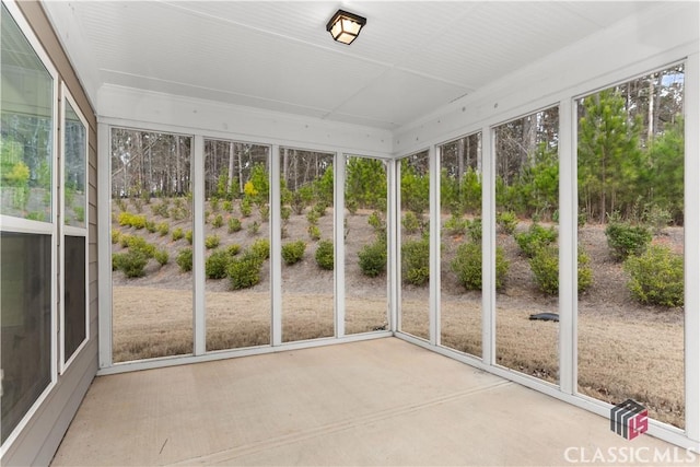 unfurnished sunroom with a healthy amount of sunlight