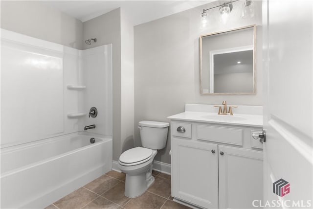 full bathroom featuring vanity, bathtub / shower combination, tile patterned floors, and toilet