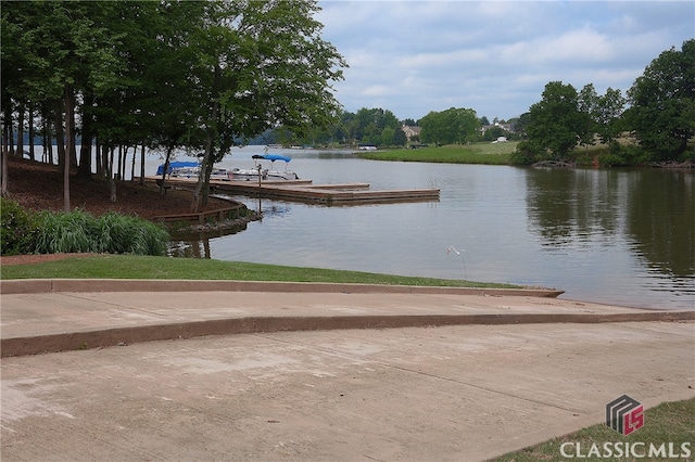 dock area featuring a water view