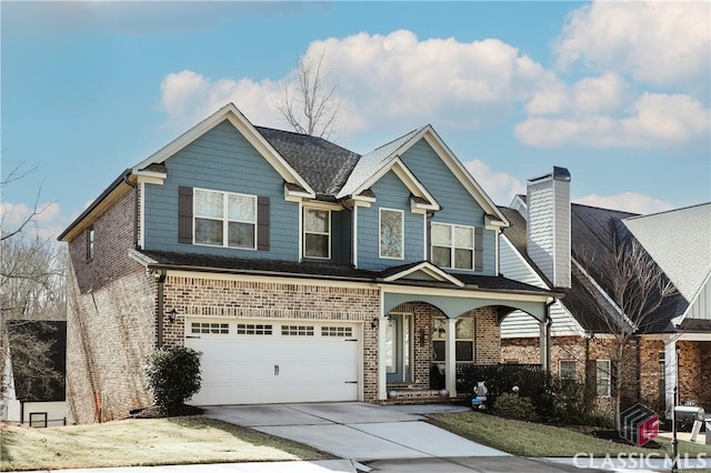 view of front of property featuring a garage